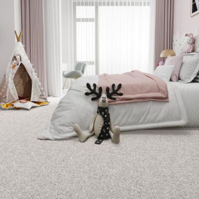 plush flecked carpets in a kids bedroom with pink accents